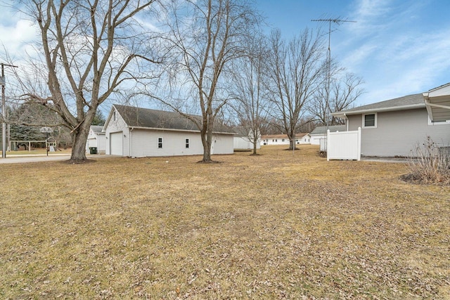 view of yard featuring a garage