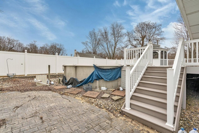 view of patio featuring a covered pool