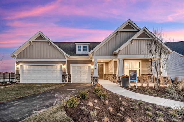 craftsman inspired home featuring a garage