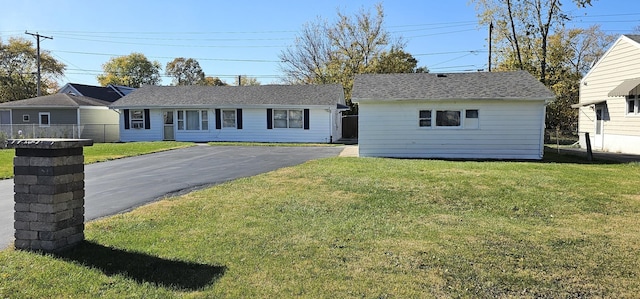 ranch-style house with a front yard