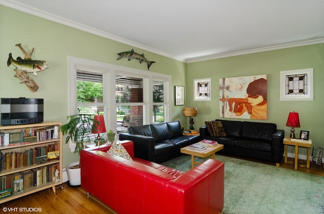 living room featuring hardwood / wood-style flooring and crown molding