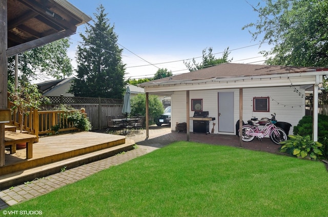 view of yard featuring a deck