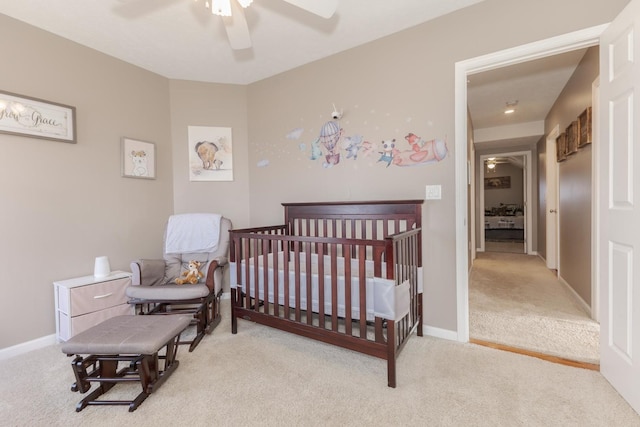 carpeted bedroom featuring ceiling fan