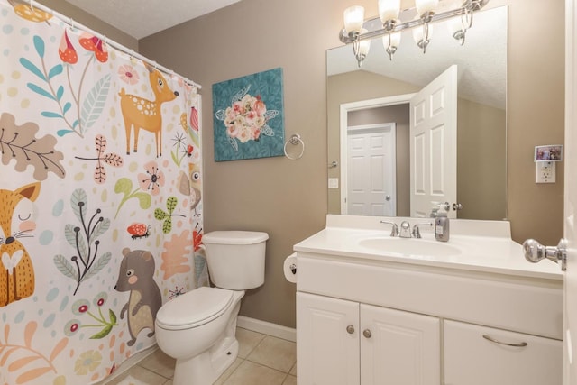 bathroom with tile patterned flooring, vanity, lofted ceiling, and toilet