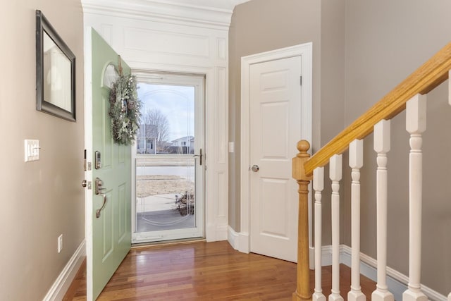 foyer entrance featuring hardwood / wood-style flooring