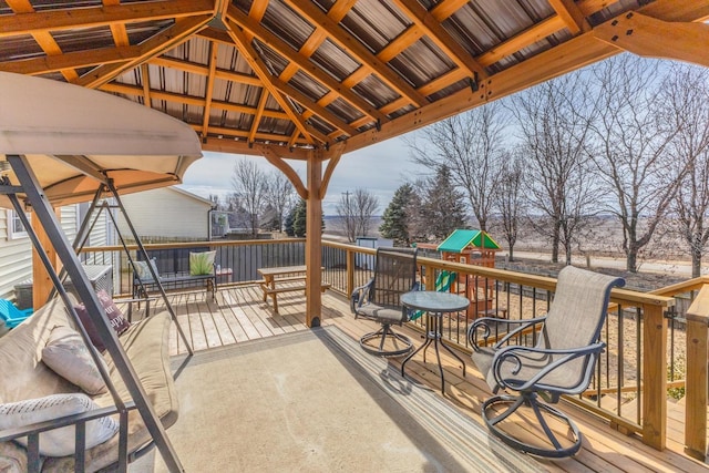 view of patio / terrace featuring a gazebo and a playground