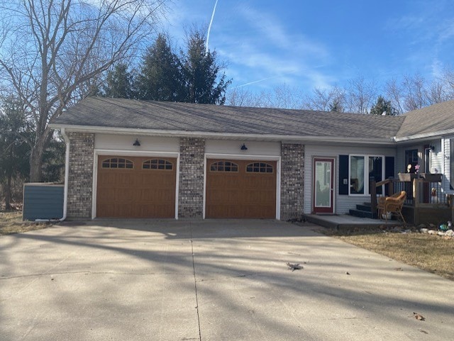 view of side of property with a garage