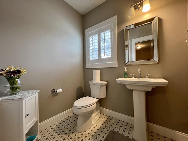 bathroom featuring toilet