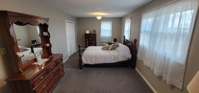 carpeted bedroom with a closet