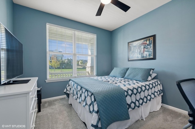 bedroom featuring ceiling fan and light colored carpet