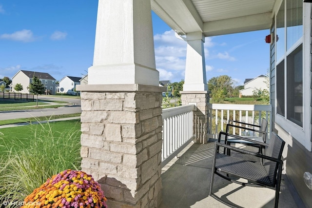 balcony featuring a porch