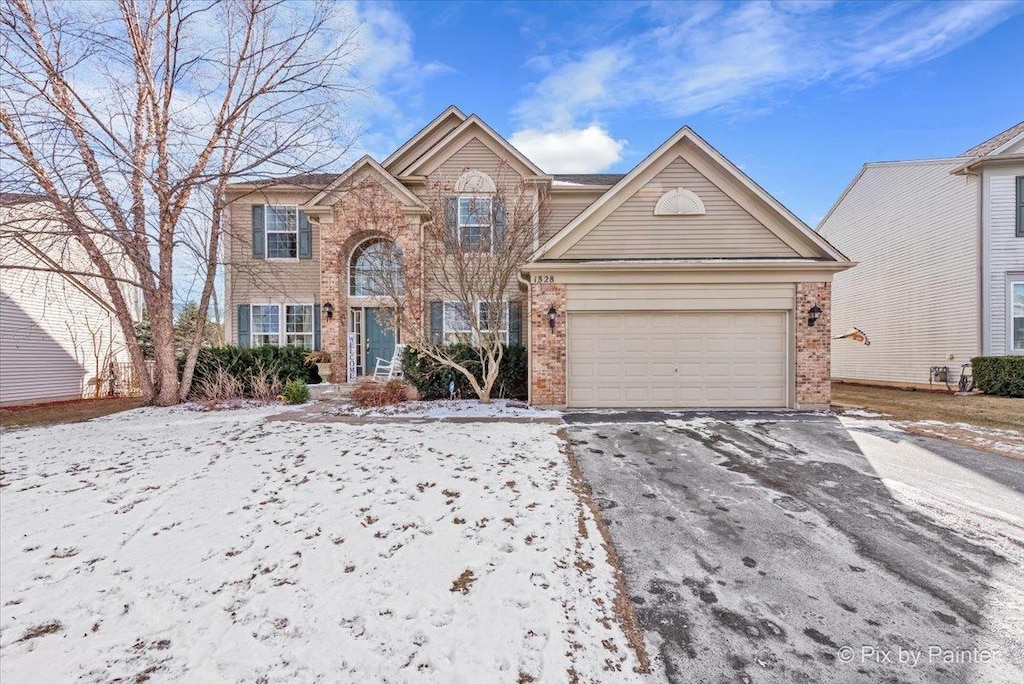 front of property featuring a garage