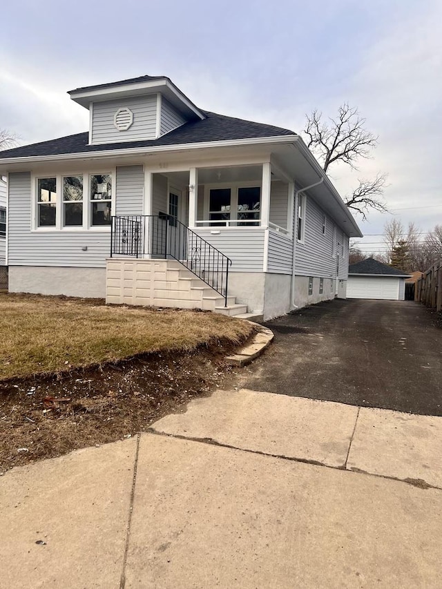 bungalow-style house featuring a garage