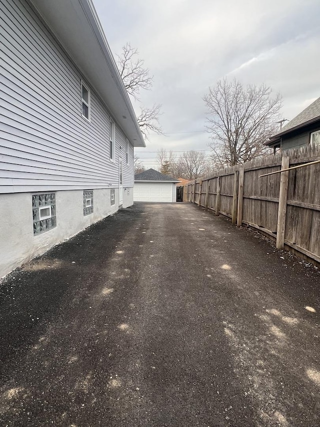 view of property exterior featuring a garage