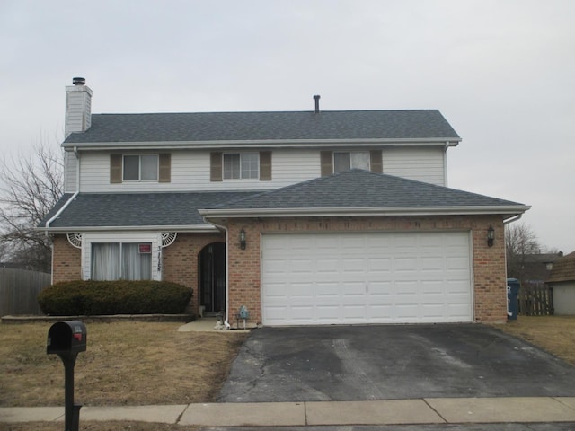 view of front property with a garage