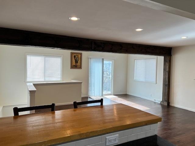 interior space with dark wood-type flooring