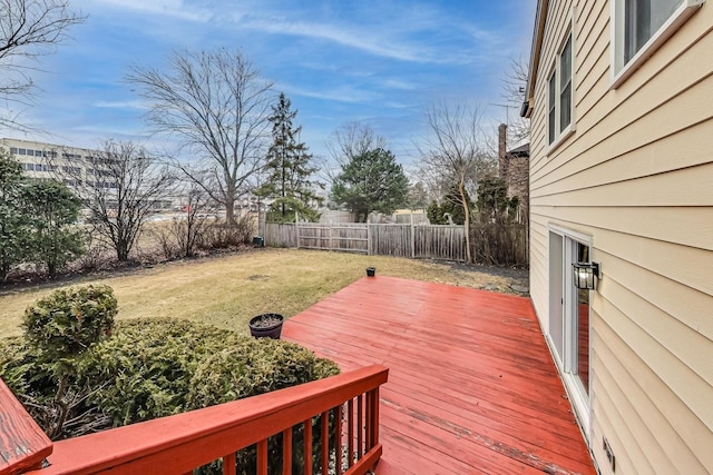 deck featuring a lawn