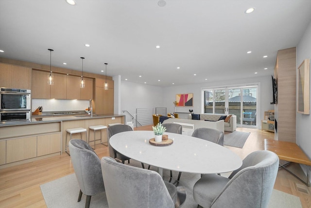 1834 N Rockwell St Unit 1R, Chicago, IL 60647 - dining room featuring light wood-style flooring and recessed lighting