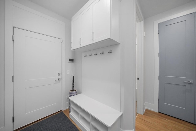 1834 N Rockwell St Unit 1R, Chicago, IL 60647 - mudroom featuring light wood finished floors and baseboards