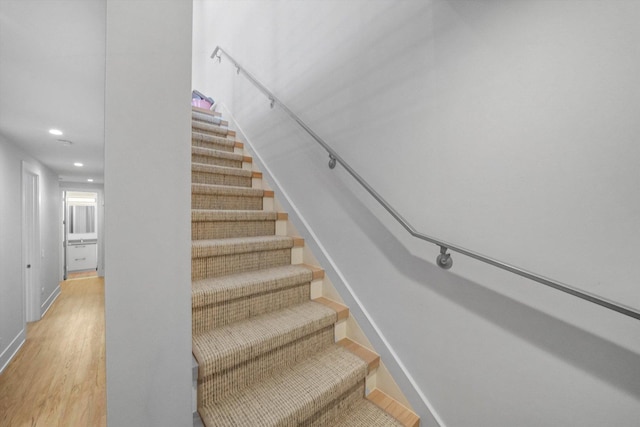 1834 N Rockwell St Unit 1R, Chicago, IL 60647 - stairs featuring baseboards, recessed lighting, and wood finished floors