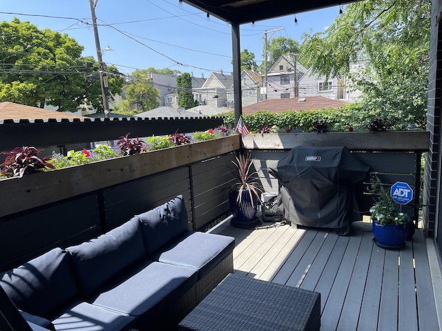 1834 N Rockwell St Unit 1R, Chicago, IL 60647 - wooden terrace featuring outdoor lounge area, a grill, and a residential view