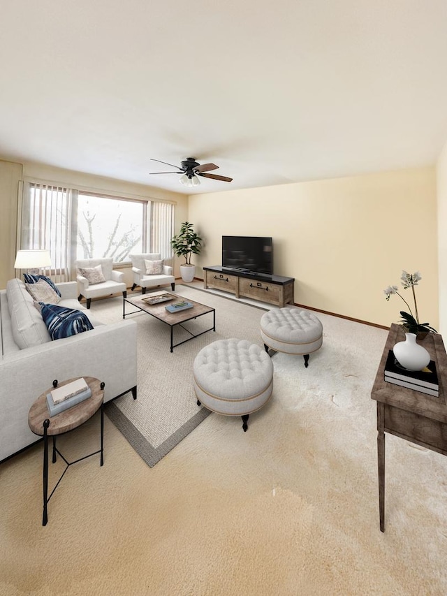 living room with ceiling fan and carpet floors