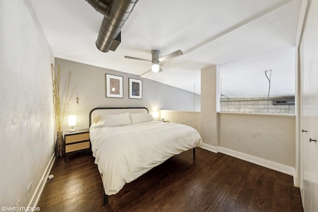 bedroom with dark wood-type flooring and ceiling fan