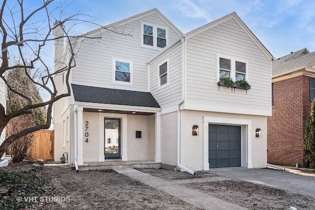 view of front of home with a garage