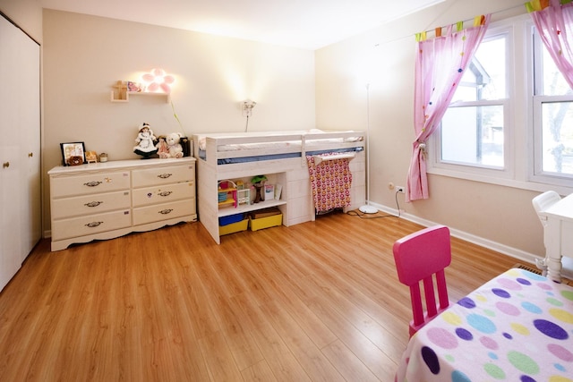 bedroom featuring light hardwood / wood-style flooring