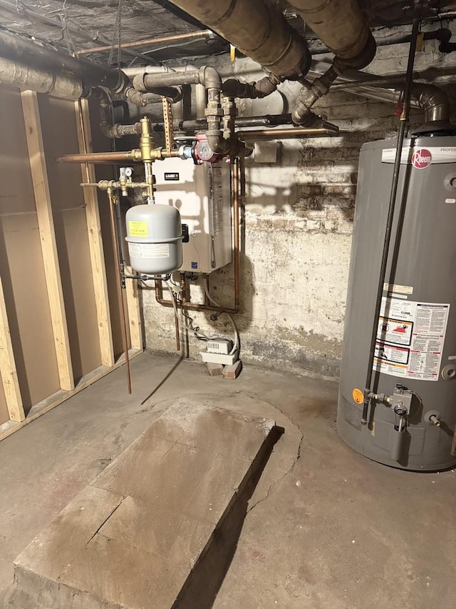 utility room featuring water heater