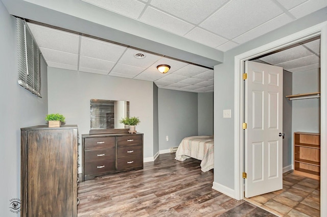 1401 Rolling Pass, Beecher, IL 60401 - bedroom with a drop ceiling, baseboards, and wood finished floors