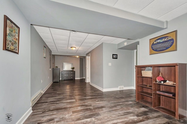 1401 Rolling Pass, Beecher, IL 60401 - hallway featuring a drop ceiling, wood finished floors, baseboards, and baseboard heating