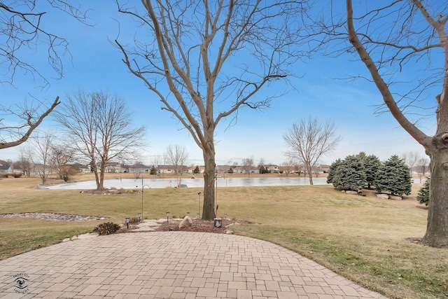 view of patio / terrace featuring a water view