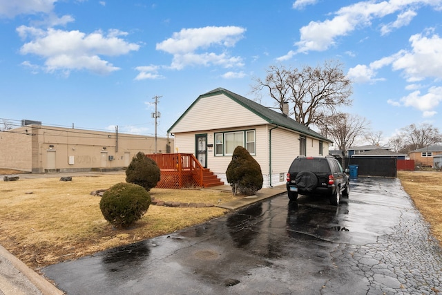 view of home's exterior with a yard