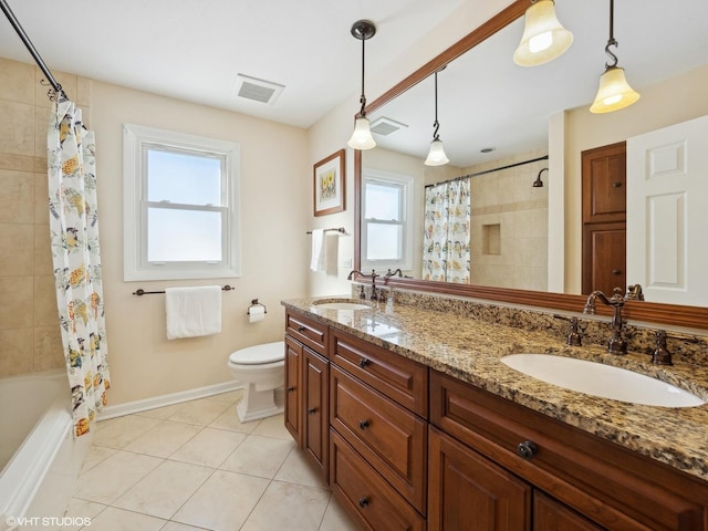 full bath featuring tile patterned floors, visible vents, a sink, and double vanity