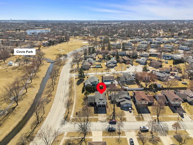 aerial view with a water view and a residential view