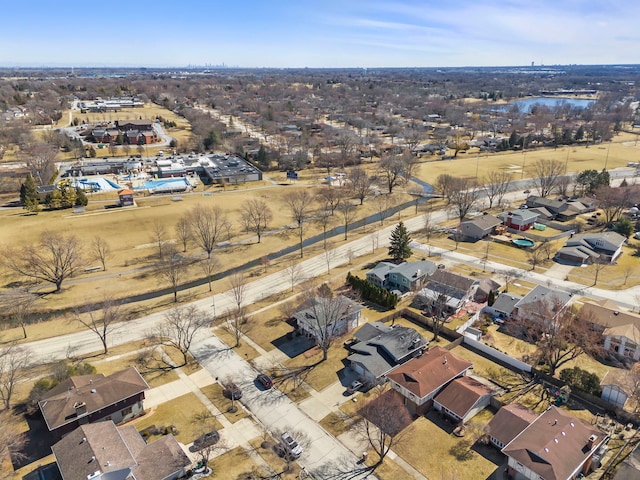 aerial view featuring a water view and a residential view