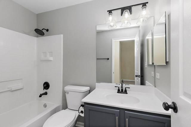 full bathroom with shower / bath combination, vanity, and toilet