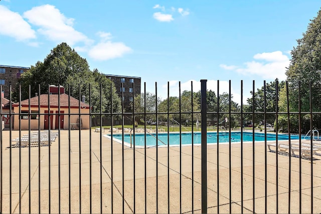 pool featuring fence