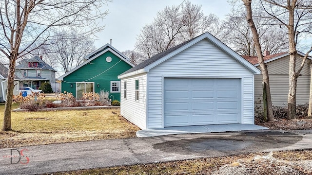 garage with a lawn