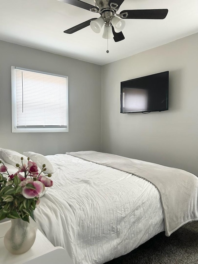 bedroom featuring ceiling fan