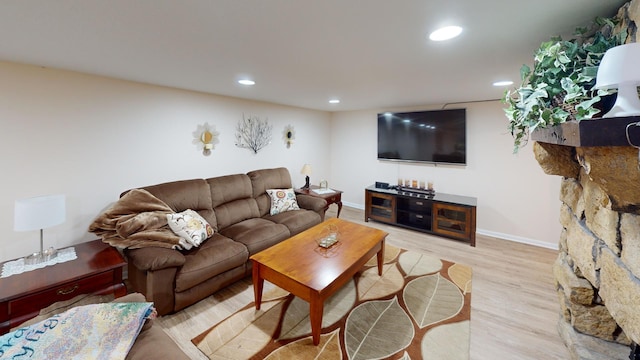 living room with light hardwood / wood-style flooring