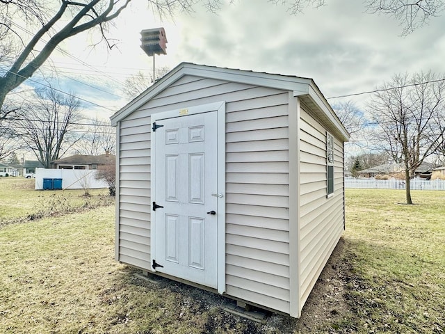 view of outdoor structure with a yard