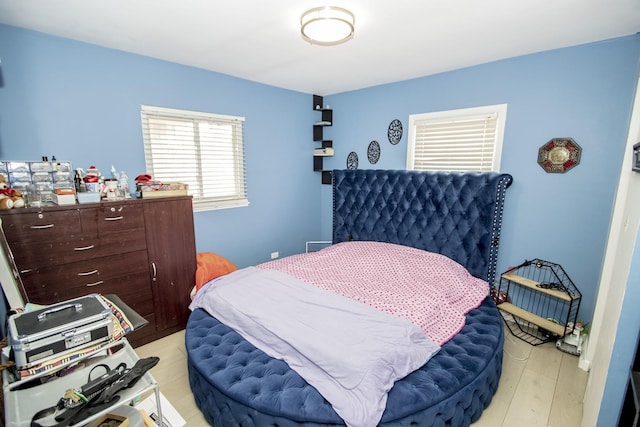 bedroom featuring light hardwood / wood-style floors