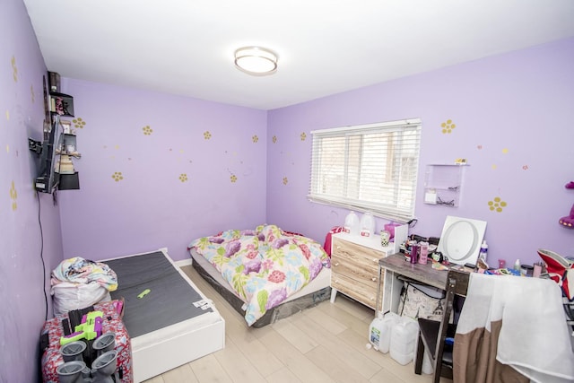 bedroom featuring light hardwood / wood-style floors