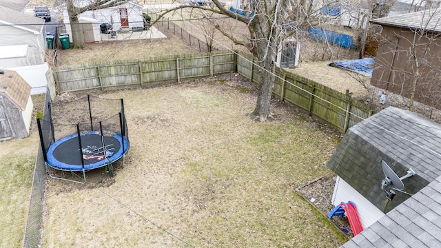 view of yard featuring a trampoline