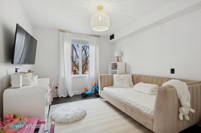 bedroom featuring hardwood / wood-style flooring