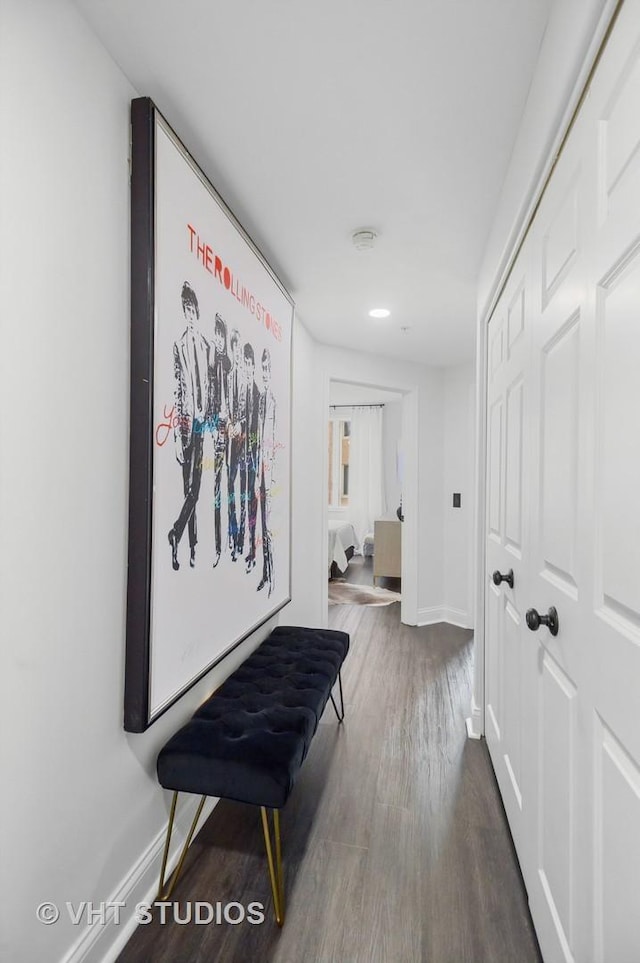 hallway featuring wood-type flooring