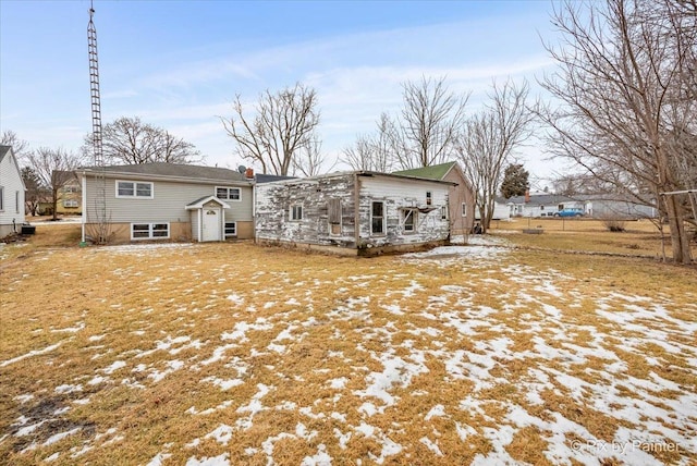 snow covered property featuring a chimney