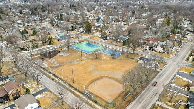 birds eye view of property with a residential view